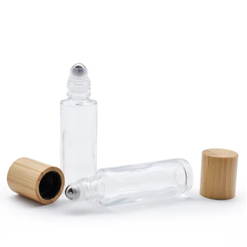 10pcs wholesae Празен бамбуков капак етерично масло матирано прозрачно стъкло ролка върху парфюмна бутилка със стоманена ролкова топка 5ml 10ml 15ml