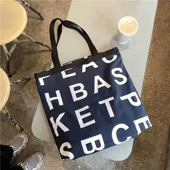 Универсални чанти за рамо за жени Писма с голям капацитет Корейски чанти 2022 Пролет Нов дизайн Колежани Студенти Платно голяма пазарска чанта